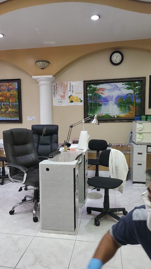 Pedicure chairs arranged in a clean salon space.