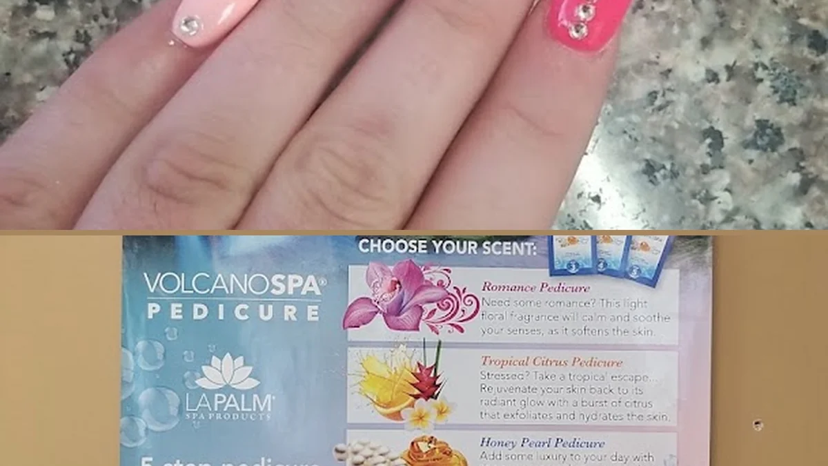 Close-up of acrylic nails beside manicure supplies.
