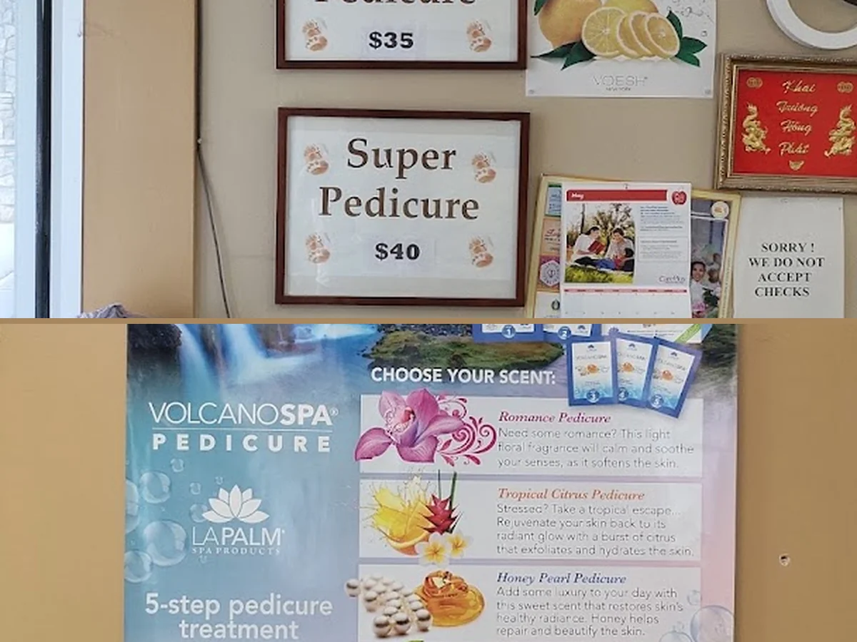 Close-up of acrylic nails beside manicure supplies.